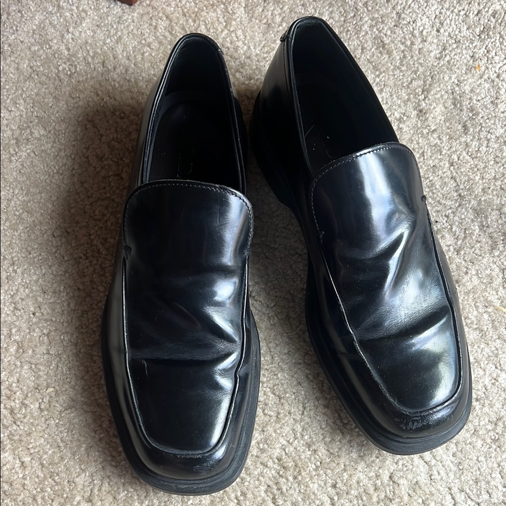 Prada Black Leather Slip-On Loafers with Minimalist Design